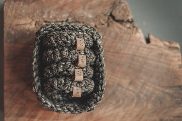 Crocheted Charcoal Wool coaster set in matching basket 