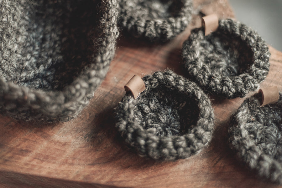 Crocheted Charcoal Wool coaster set in matching basket  Edit alt text